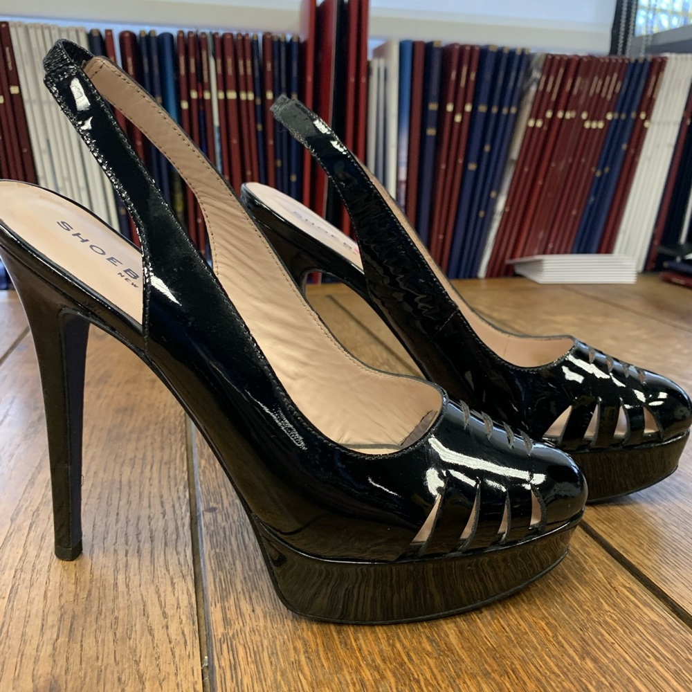 Shoe Box black patent leather platform pumps